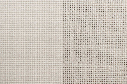 A side by side painting canvas comparison showing linen and cotton canvas.