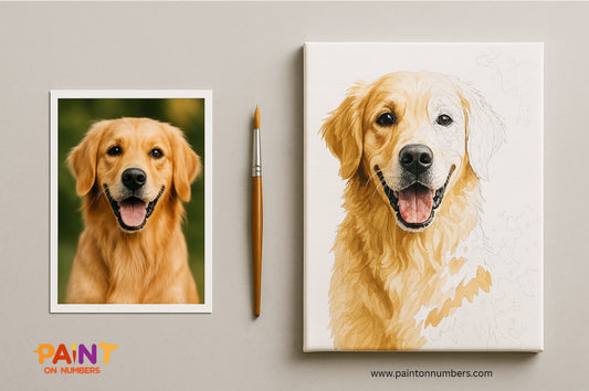 Flat lay marketing photo showing a golden retriever picture, a wooden paintbrush, and a partially painted paint by numbers canvas in Apple-style minimalist design