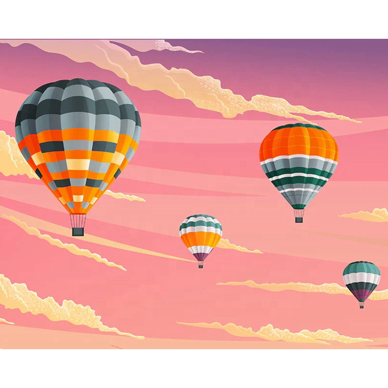 Four colorful hot air balloons floating in a pink-orange sunset sky with scattered clouds.