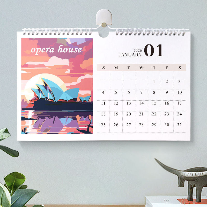 Wall calendar with Sydney Opera House design on a light gray wall.
