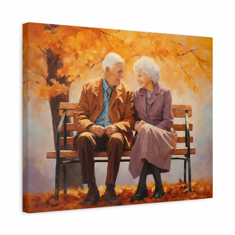 Elderly couple sitting on a park bench under golden autumn leaves, smiling warmly at each other in a peaceful, romantic setting.