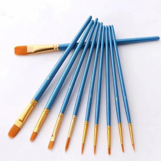 Set of blue paintbrushes with gold ferrules on a white background