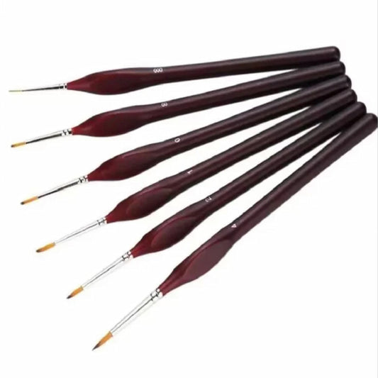 Set of paint brushes with red handles on a white background