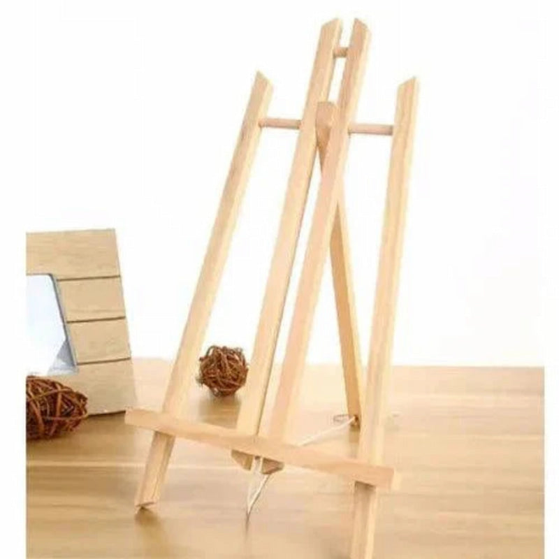 Wooden easel on a wooden surface with a white background