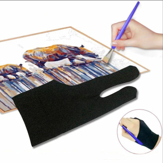Hand wearing a black glove holding a paintbrush over a painting of abstract art.