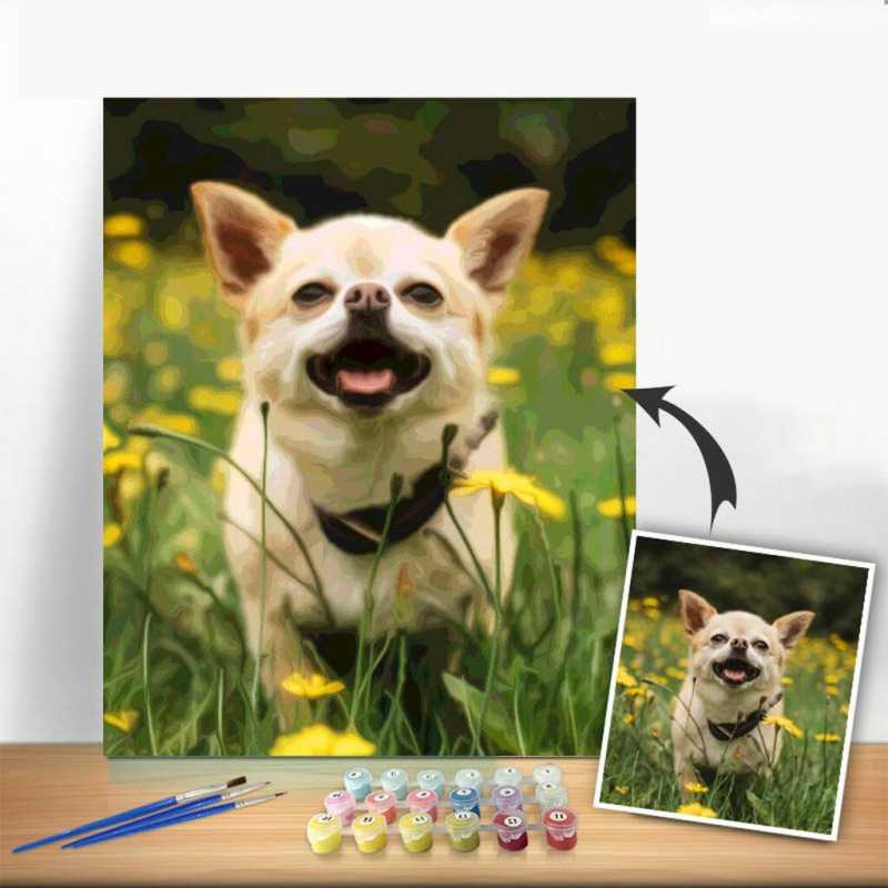Painting of a dog in a field with yellow flowers, next to a photo of the dog for reference.