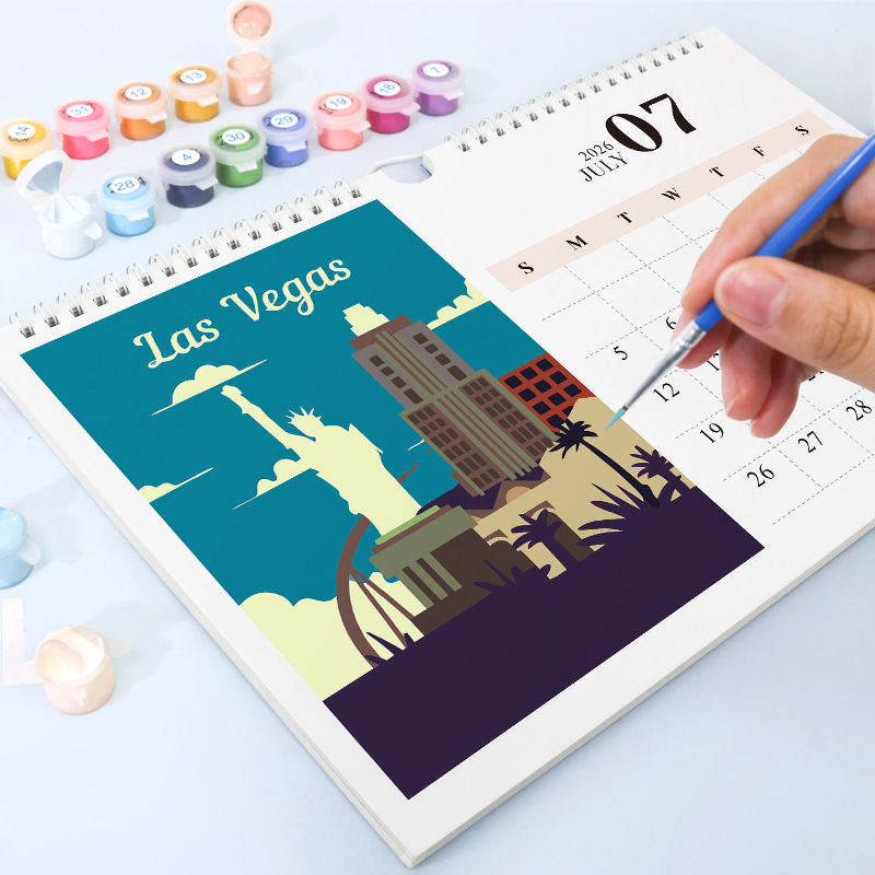 Calendar with Las Vegas illustration and paint supplies on a light blue background